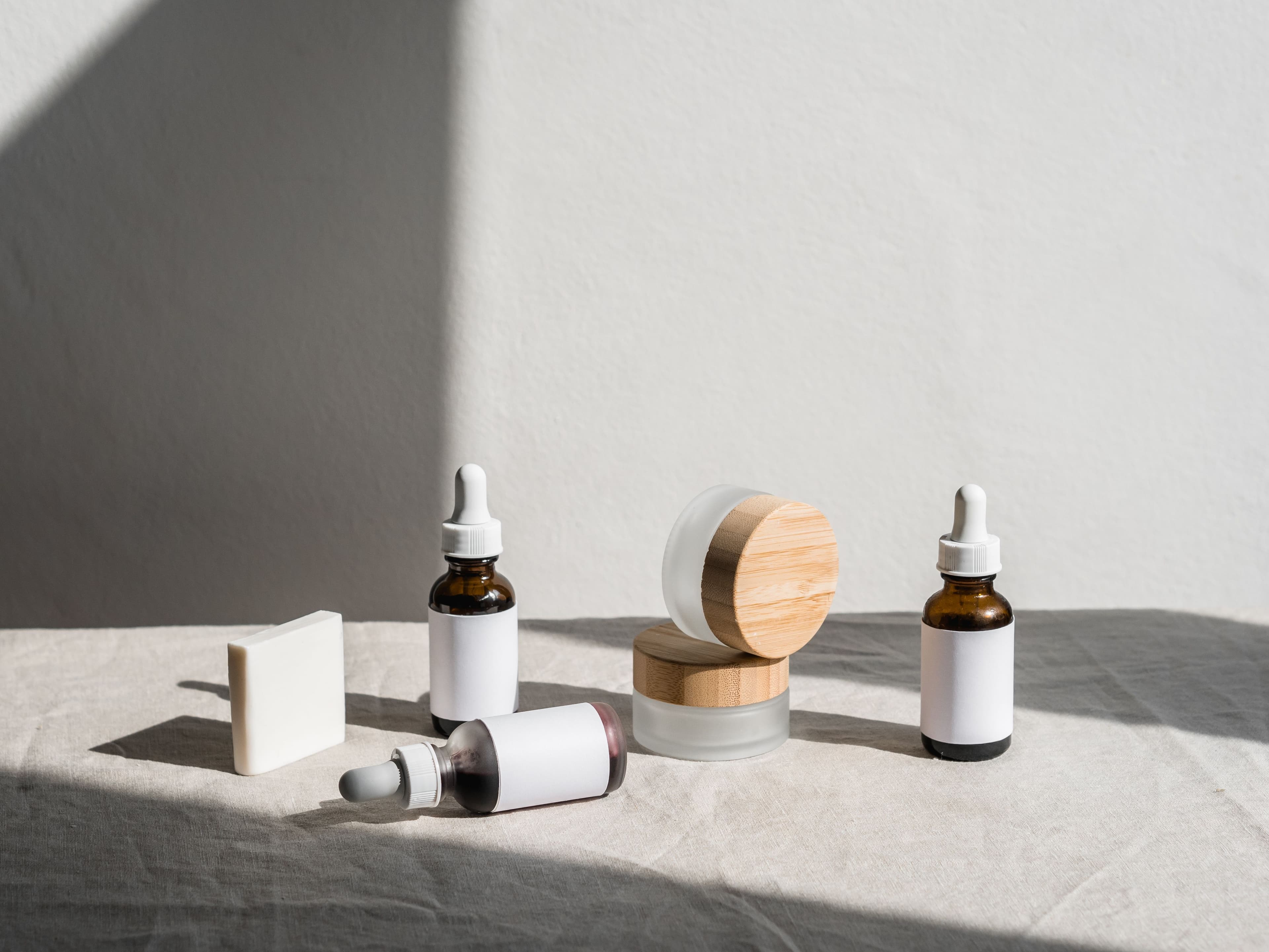 Skincare bottle on a mineral surface