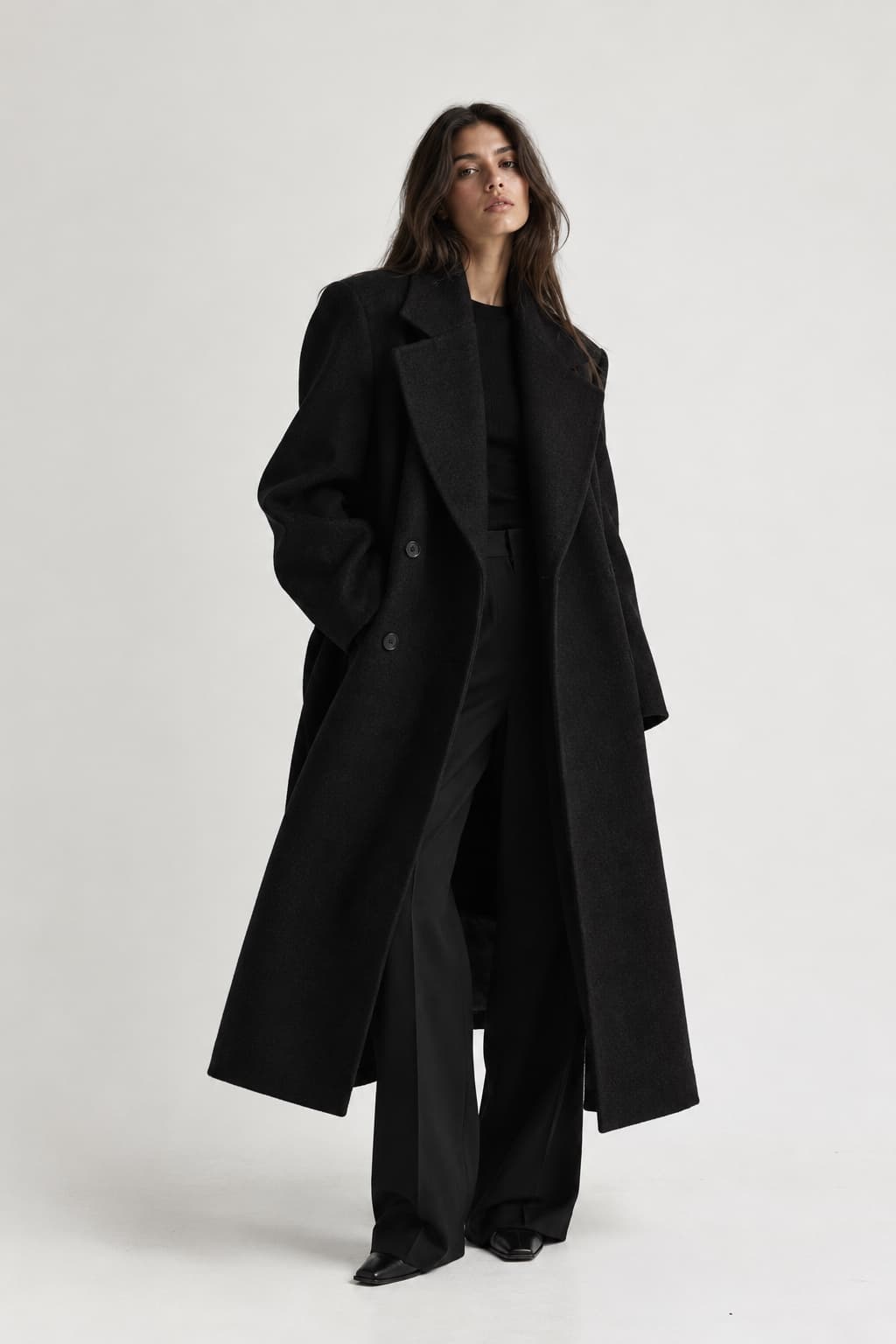 Full-length black wool coat